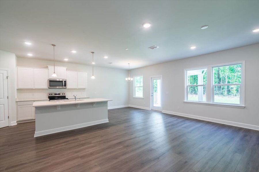 The new home Hartwell showcases a beautiful and spacious kitchen. The new home Hartwell showcases a beautiful and spacious kitchen.