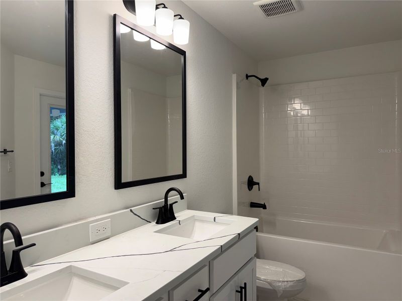 Furnished interior view inside a new home in North Port, North Port (Image 4).
