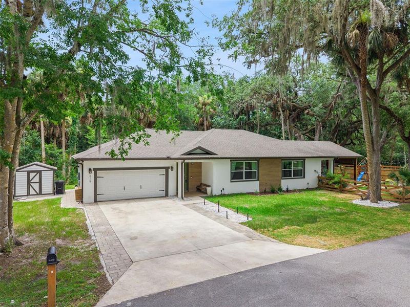 Front exterior of a new home in , Debary, FL, highlighting curb appeal (Image 25). Front exterior of a new home in , Debary, FL, highlighting curb appeal (Image 25).