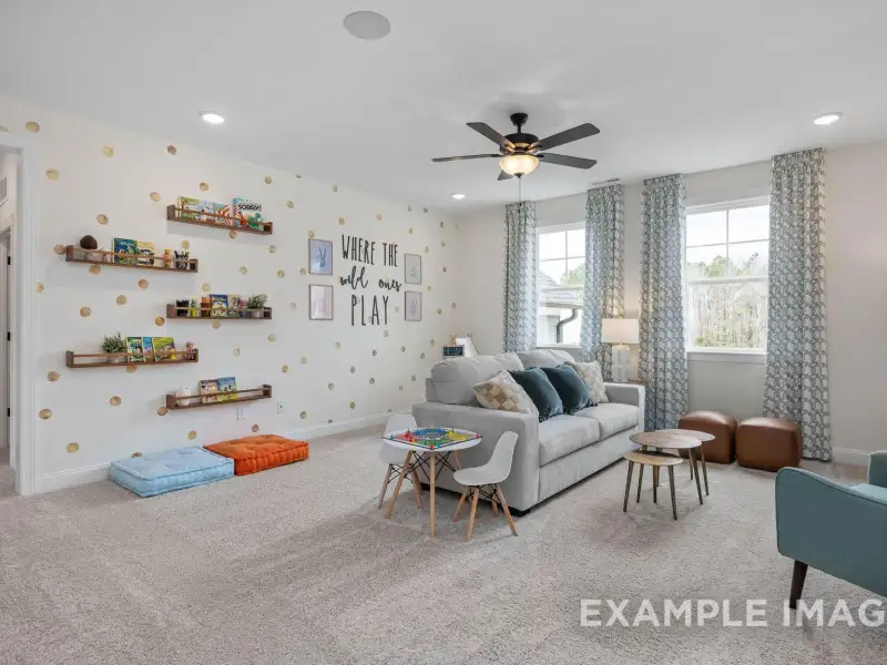 Furnished interior view inside a new home in Addison West, Holly Springs (Image 10).