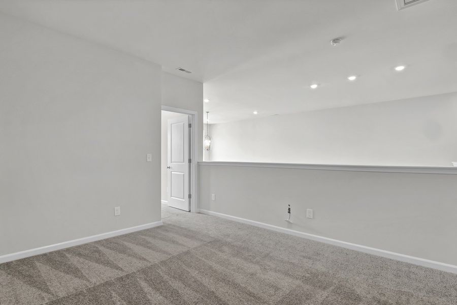Spacious, unfurnished interior of a new home in Grand Park, Leland (Image 29).