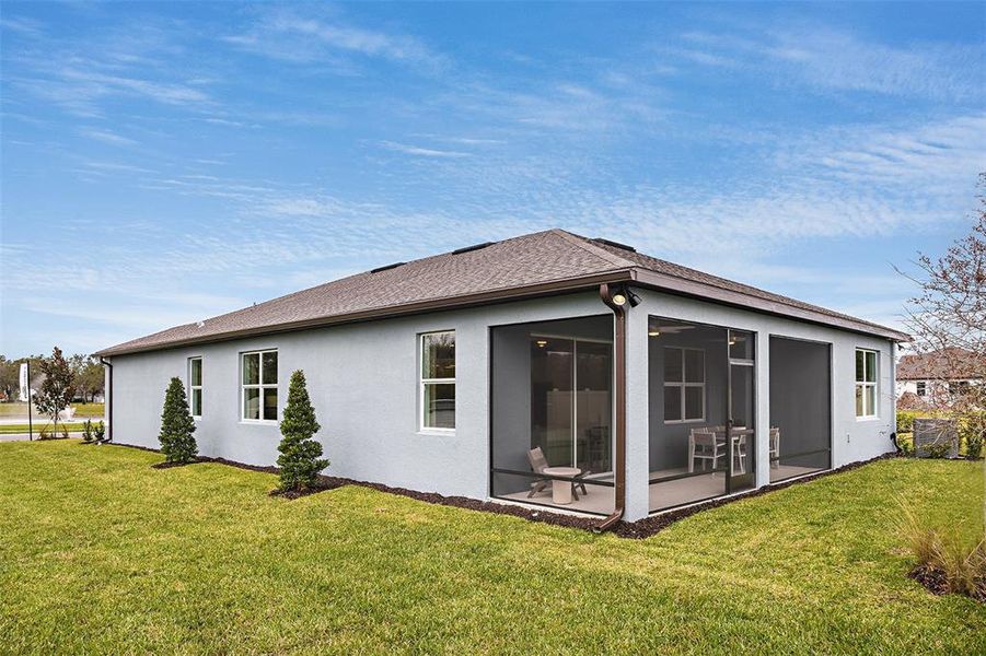 Exterior details and patio area of a home in Twisted Oaks, Wildwood (Image 3). Exterior details and patio area of a home in Twisted Oaks, Wildwood (Image 3).