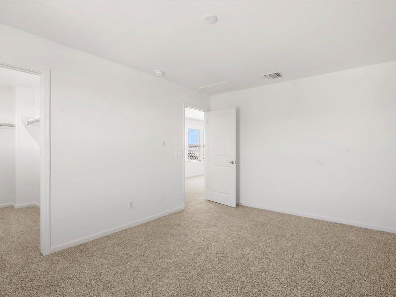Spacious, unfurnished interior of a new home in Sunset Crest - Signature Series, Tucson (Image 18).