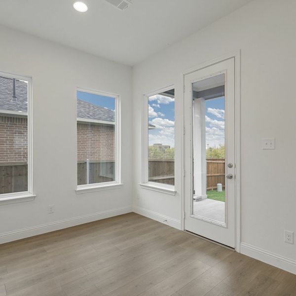 Representative unfurnished interior of a home built from the The Emery by Village Homes in Walsh, Aledo (Image 11).