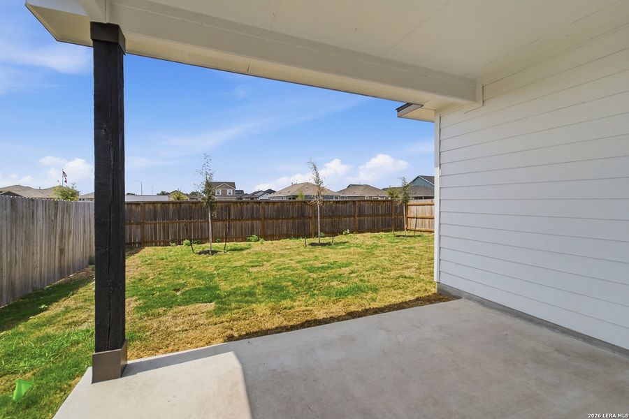 Exterior details and patio area of a home in Mesa Vista, Von Ormy (Image 21).