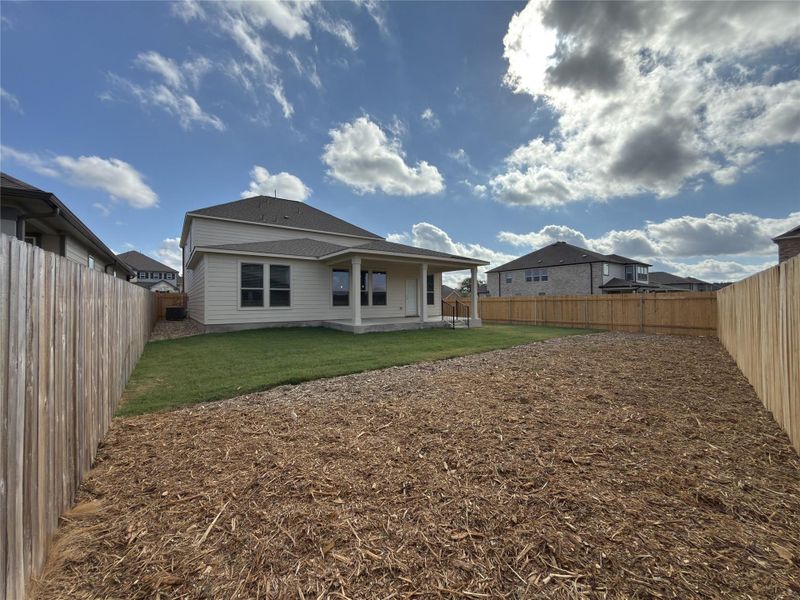 Exterior details and patio area of a home in River Bluff, Leander (Image 23).