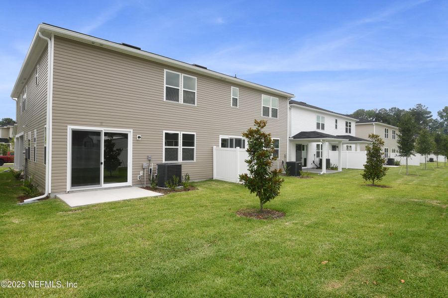 Exterior details and patio area of a home in Seasons at Park Trace, Jacksonville (Image 18).