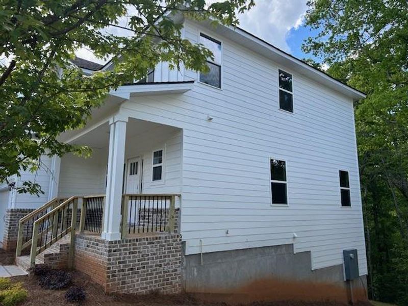 Exterior details and patio area of a home in Habersham Meadows, Demorest (Image 3).