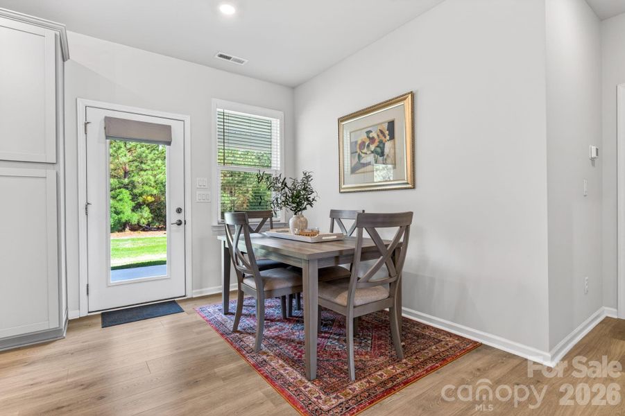 Furnished interior view inside a new home in Esplanade at Northgate, Indian Trail (Image 17).