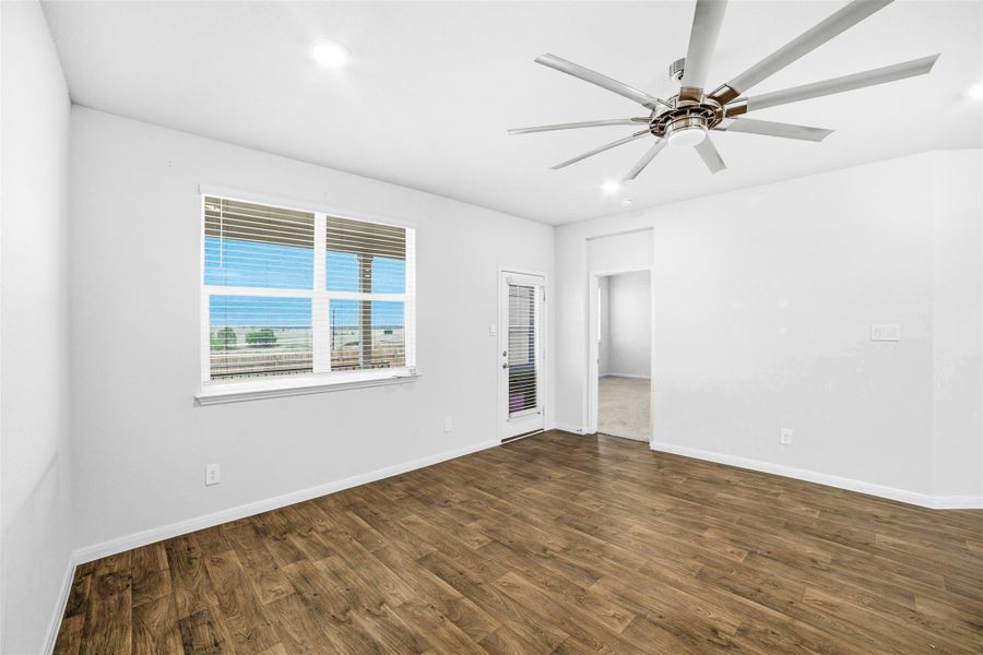 Unfurnished room with dark wood-style flooring, recessed lighting, and ceiling fan Unfurnished room with dark wood-style flooring, recessed lighting, and ceiling fan