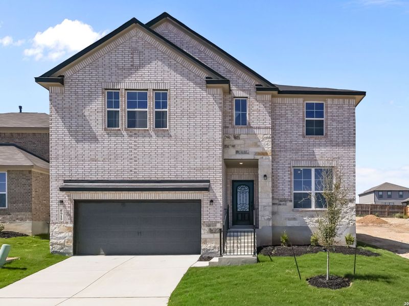 Front exterior of a new home in Comanche Ridge, San Antonio, TX, highlighting curb appeal (Image 25).