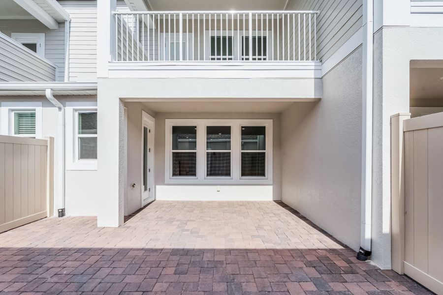 Representative exterior details of a home built from the Newton by Rockwell Homes in Harvest at Ovation - Townhomes, Winter Garden (Image 51). Representative exterior details of a home built from the Newton by Rockwell Homes in Harvest at Ovation - Townhomes, Winter Garden (Image 51).