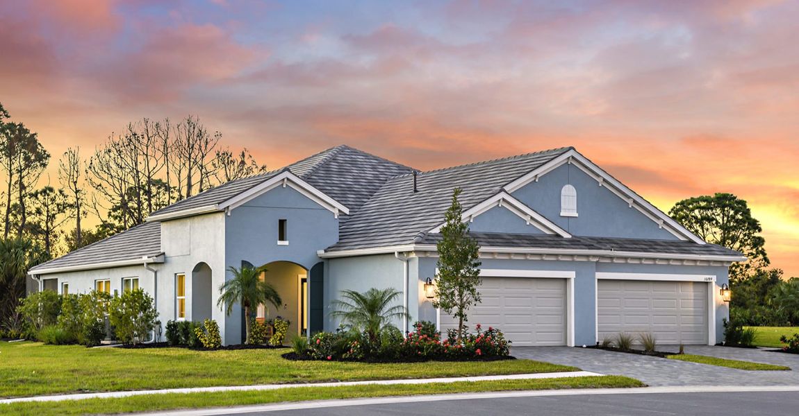 Representative exterior photo of a completed home built from the Sandcastle by Neal Communities in Grand Park, Sarasota, FL (Image 1). Representative exterior photo of a completed home built from the Sandcastle by Neal Communities in Grand Park, Sarasota, FL (Image 1).