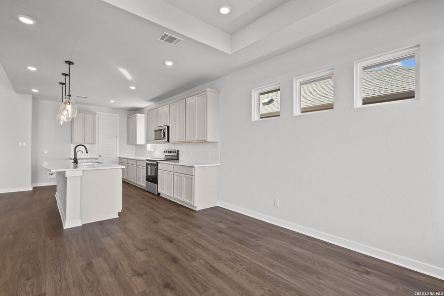 Furnished interior view inside a new home in Megan's Landing, Castroville (Image 11).