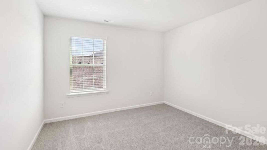 Spacious, unfurnished interior of a new home in Wallace Springs, Statesville (Image 38).