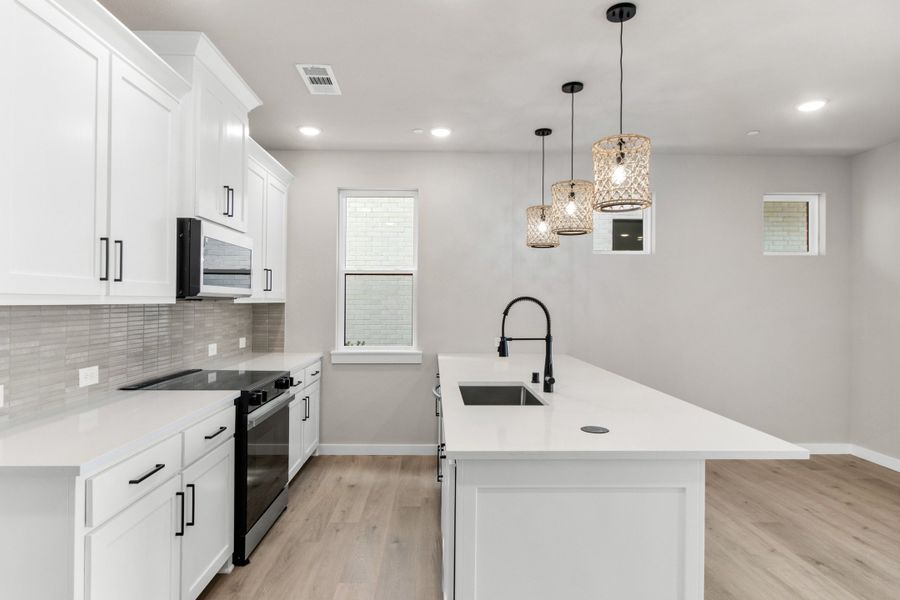 Furnished interior view inside a new home in Wildridge, Oak Point (Image 12).