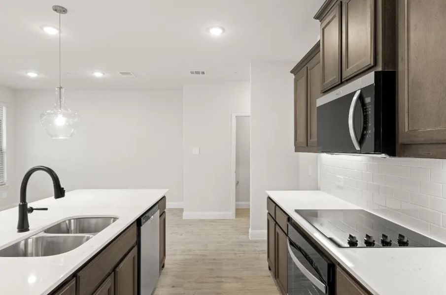 Front exterior of a new home in Sereno Oaks at Buckner Terrace, Dallas, TX, highlighting curb appeal (Image 6).