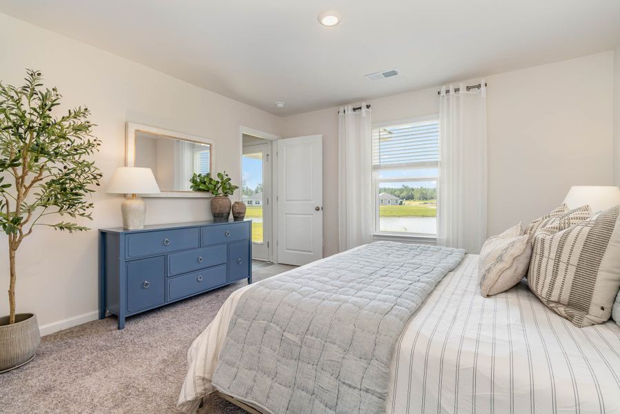 Representative furnished interior of a home built from the HELENA by D.R. Horton in Jordanville Farms, Galivants Ferry (Image 30).