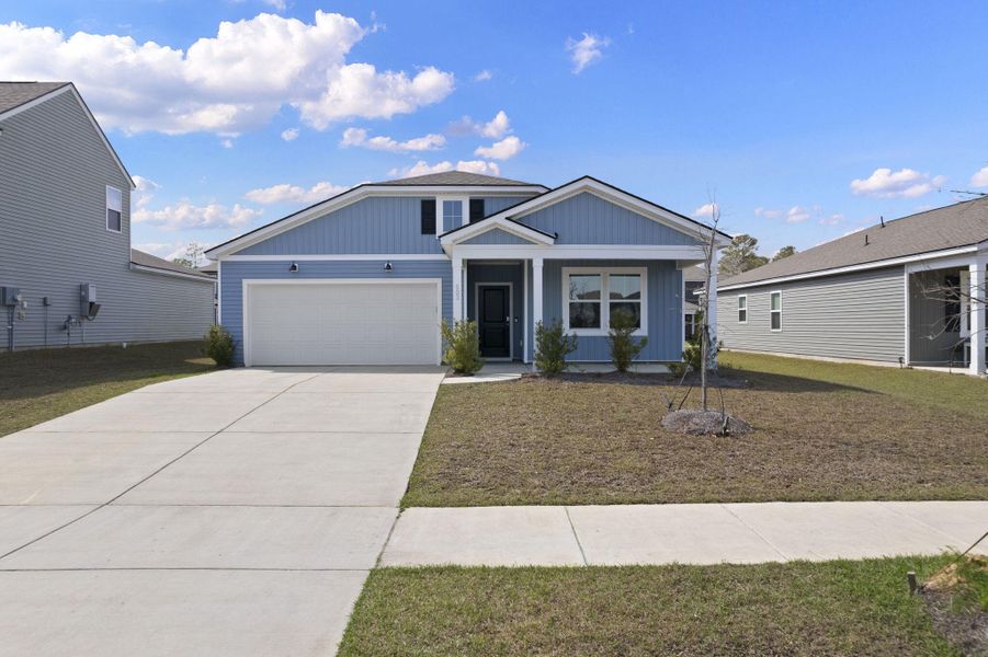 Front exterior of a new home in Bradford Pointe, Summerville, SC, highlighting curb appeal (Image 20).