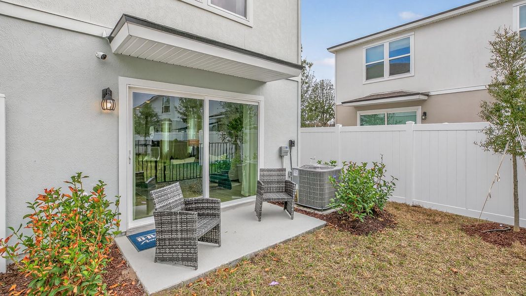 Exterior details and patio area of a home in Irongate Villas, Jacksonville (Image 3).