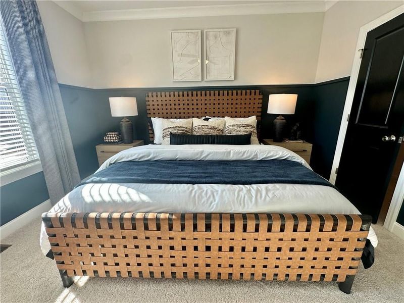 Owners Bedroom showcasing King Sized Bed *Images shown are from a decorated model of the same floor plan. Design selections and color packages will vary by home.*