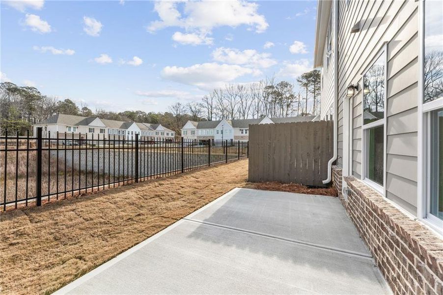 Exterior details and patio area of a home in River Walk Place, Lawrenceville (Image 15).