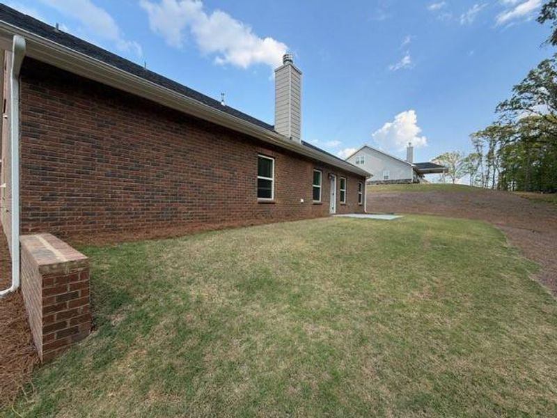 Exterior details and patio area of a home in Tuscany Hills, Douglasville (Image 15).