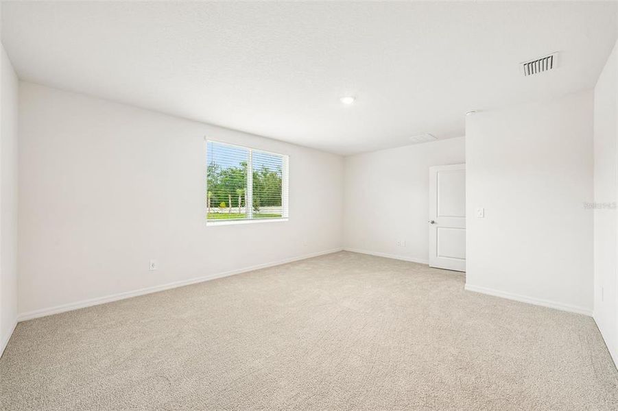 Spacious, unfurnished interior of a new home in Pine Ridge Meadows, Hudson (Image 20).