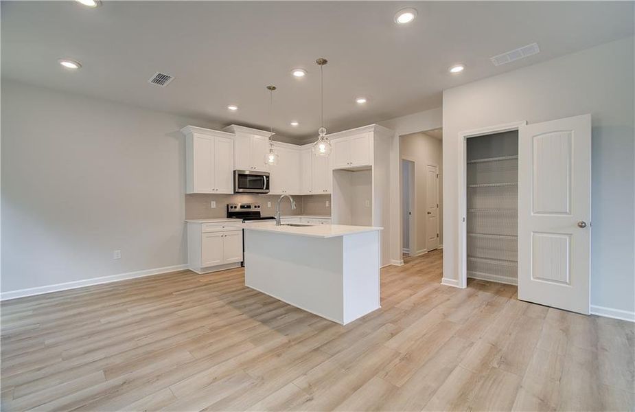 Furnished interior view inside a new home in Enclave at Evergreen, Fairburn (Image 6).