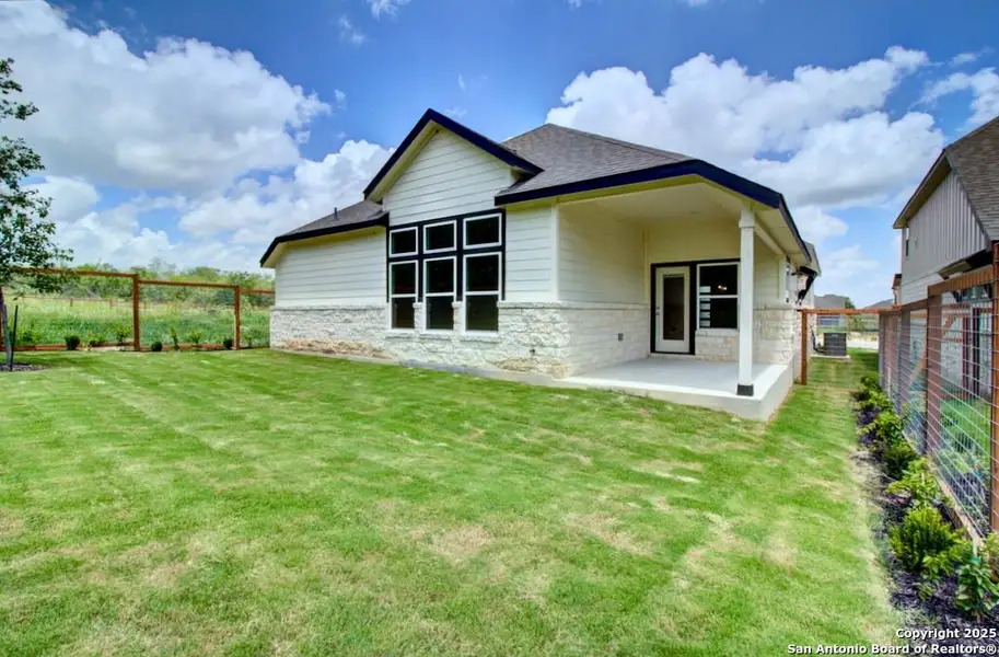 Exterior details and patio area of a home in The Crossvine, Schertz (Image 3).