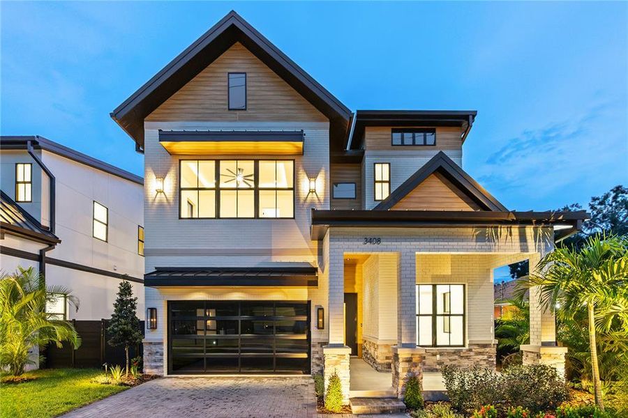 Front exterior of a new home in , Tampa, FL, highlighting curb appeal (Image 26). Front exterior of a new home in , Tampa, FL, highlighting curb appeal (Image 26).
