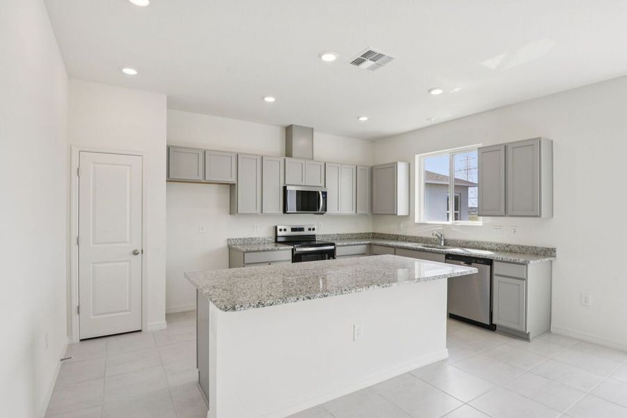 Furnished interior view inside a new home in The Preserve at Legends Pointe II, Hudson (Image 4).