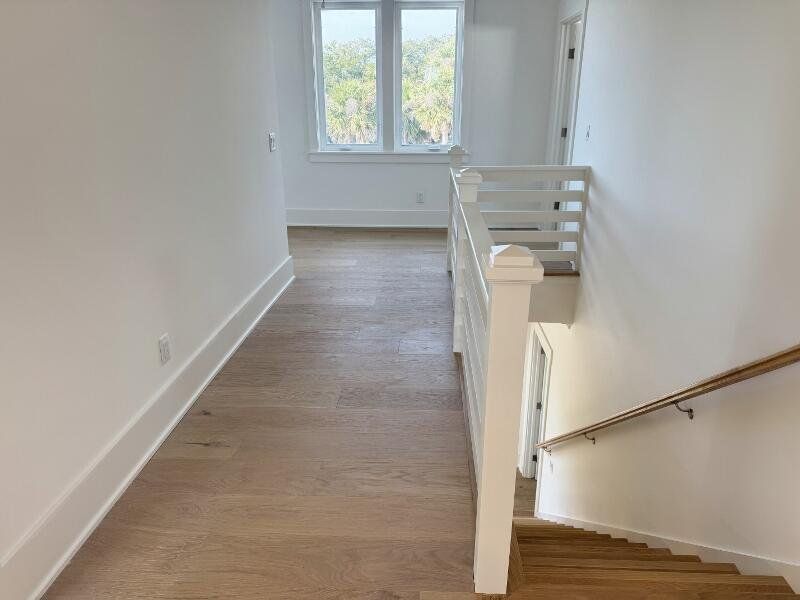 Spacious, unfurnished interior of a new home in , Edisto Beach (Image 51).