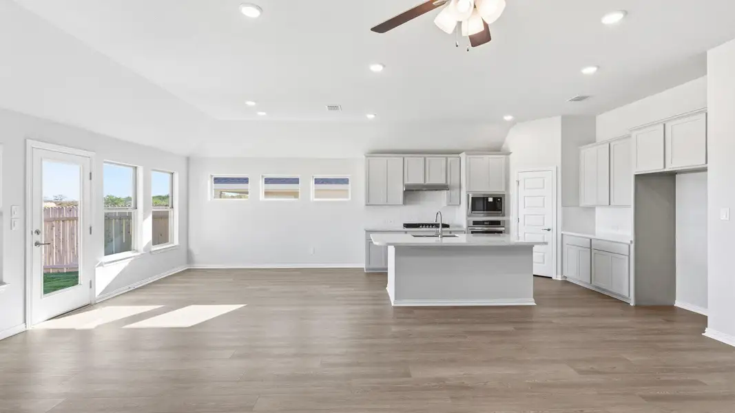 Furnished interior view inside a new home in Carillon, Manor (Image 5).