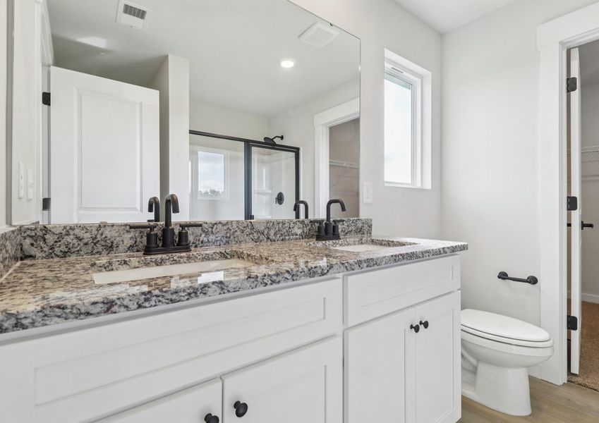 The master bathroom has double sinks The master bathroom has double sinks