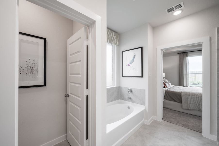 Representative furnished interior of a home built from the Caddo by Tri Pointe Homes in Mason Woods, Cypress (Image 6).