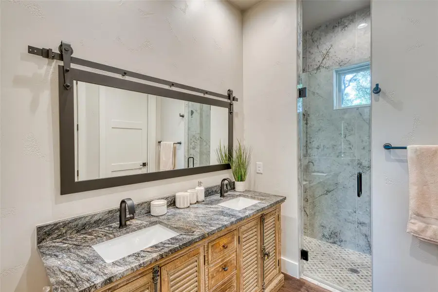 Casita Full Bathroom featuring walk in shower, separate water closet, and dual vanity Casita Full Bathroom featuring walk in shower, separate water closet, and dual vanity