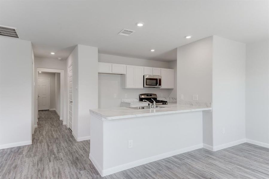 Furnished interior view inside a new home in Colony Park, Eastland (Image 8).