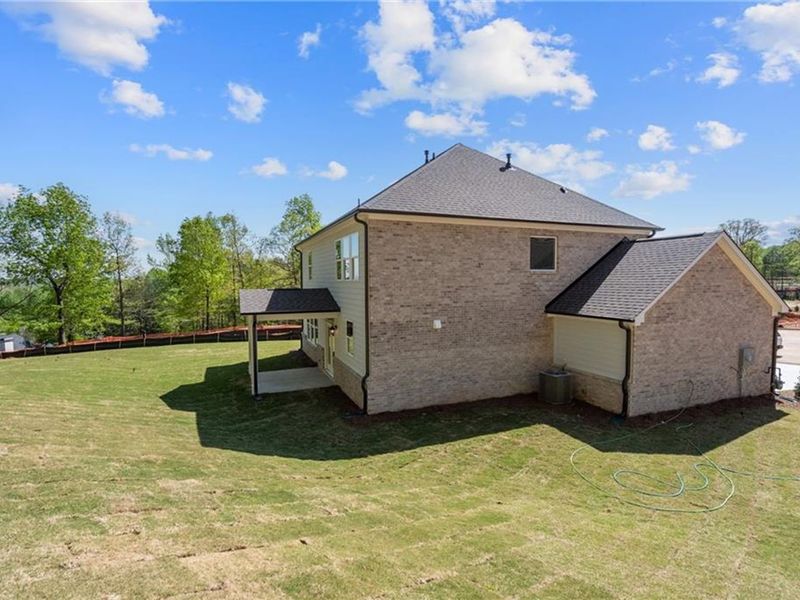 Exterior details and patio area of a home in Melody Lakeside Estates, Buford (Image 20).