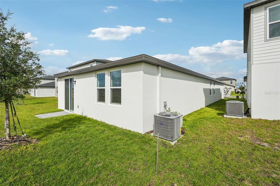 Exterior details and patio area of a home in Crosswinds - Classic Series, Haines City (Image 3).