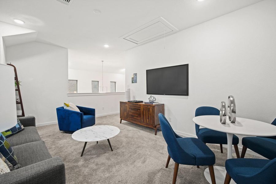 Game room in the Oak home plan by Trophy Signature Homes – REPRESENTATIVE PHOTO