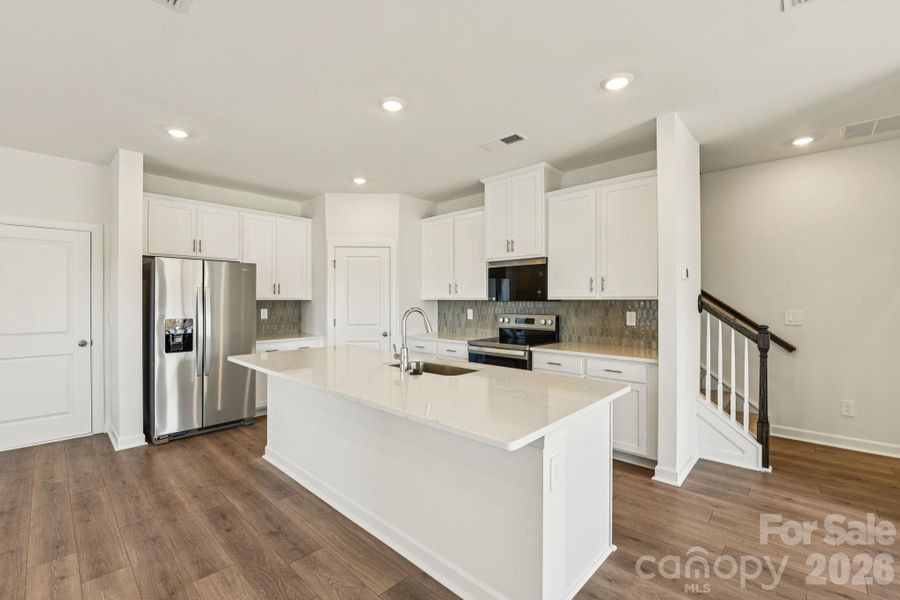Photo is not of the actual home, but is an inspirational photo of builder’s model home and may depict options, furnishings, and/or decorator features that are not included Photo is not of the actual home, but is an inspirational photo of builder’s model home and may depict options, furnishings, and/or decorator features that are not included