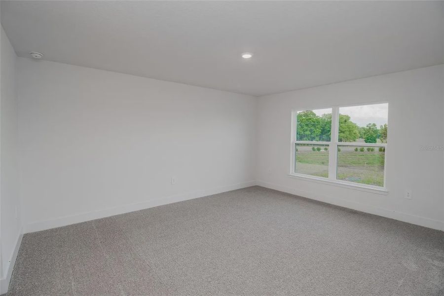 Spacious, unfurnished interior of a new home in Hickory Ridge Estates, Lake Wales (Image 23).