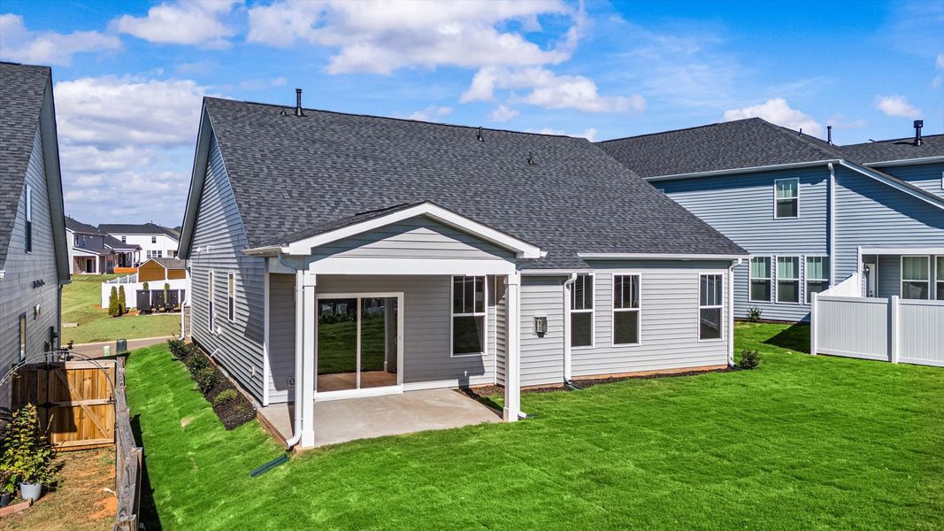 First-class design featuring a rear covered porch and tasteful architectural details
