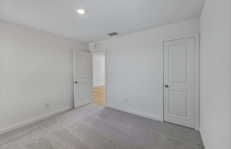 Spacious, unfurnished interior of a new home in Sunfield, Buda (Image 23). Spacious, unfurnished interior of a new home in Sunfield, Buda (Image 23).