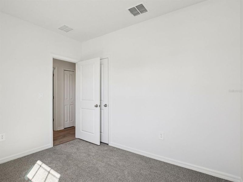 Spacious, unfurnished interior of a new home in Leyland Preserve - Premier Series, Brooksville (Image 14). Spacious, unfurnished interior of a new home in Leyland Preserve - Premier Series, Brooksville (Image 14).