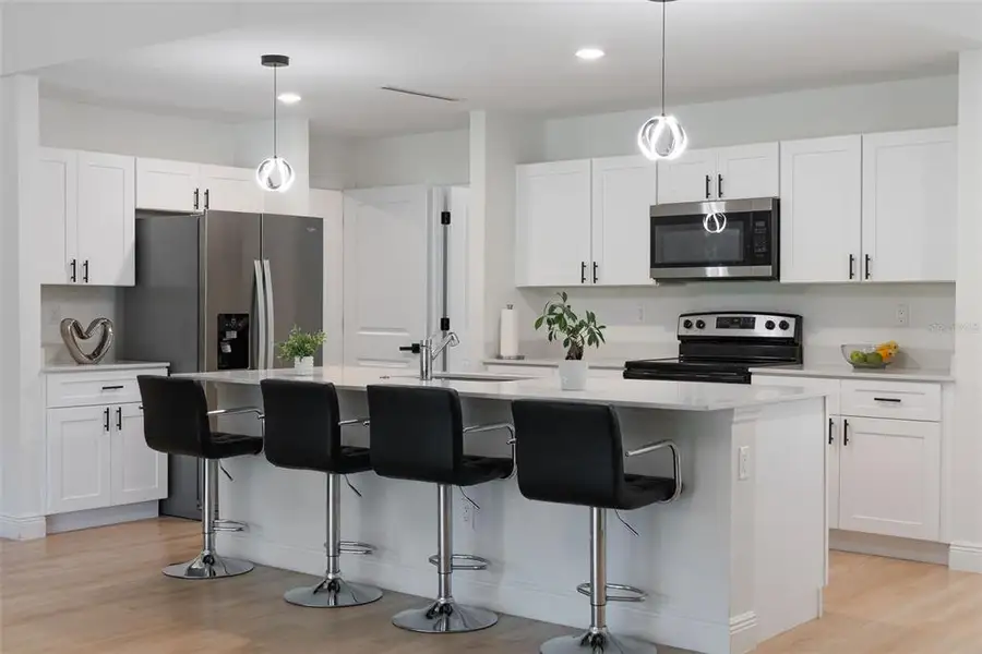 Furnished interior view inside a new home in , Port Charlotte (Image 9).