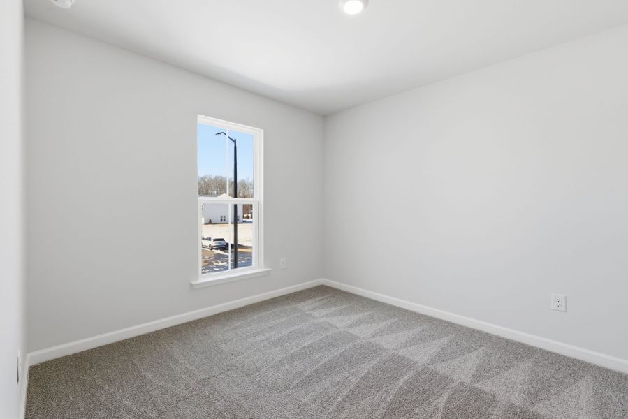Spacious, unfurnished interior of a new home in Poets Walk, Whitsett (Image 21).