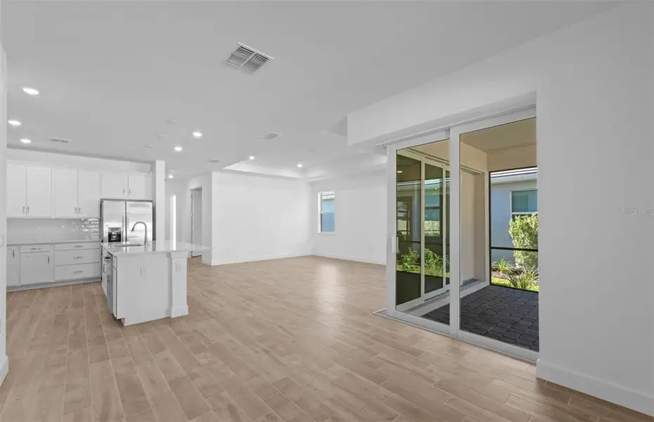 Spacious, unfurnished interior of a new home in Legacy Groves, Nokomis (Image 16).