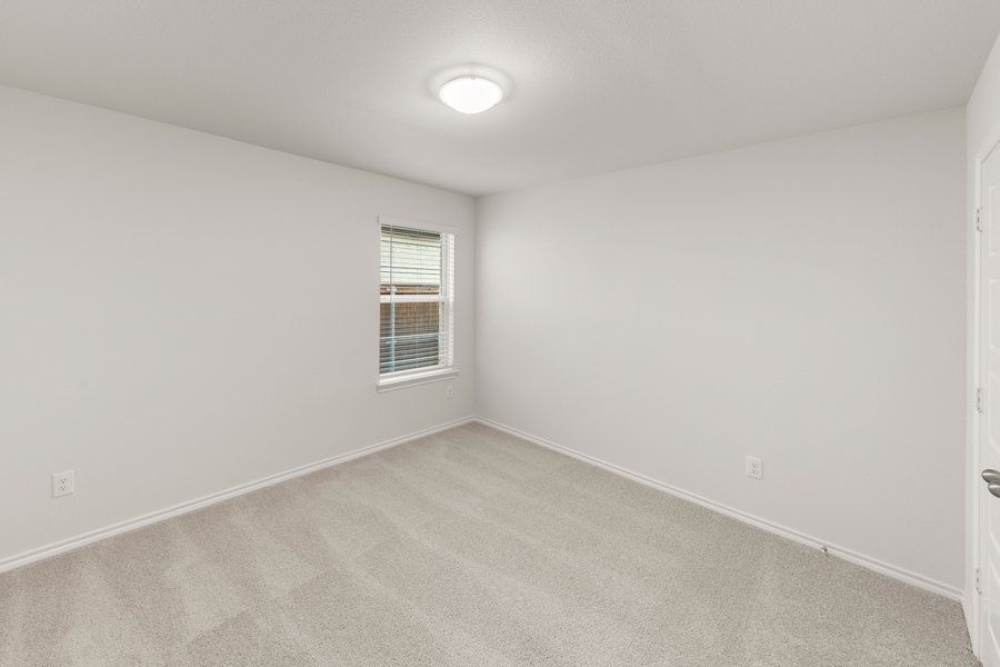 Representative exterior photo of a completed home built from the Cheyenne by Impression Homes in DeBerry Reserve, Royse City, TX (Image 14).